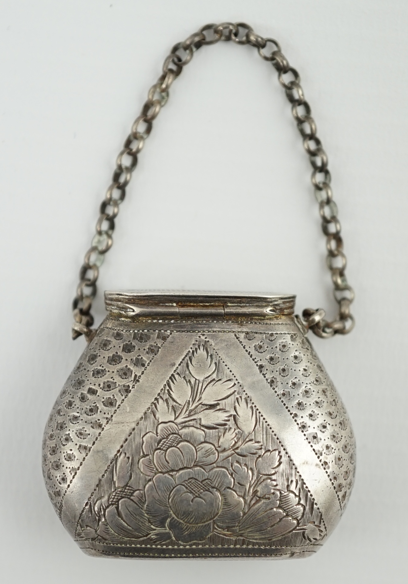 A late George III silver novelty vinaigrette, modelled as a basket/purse, by Samuel Pemberton